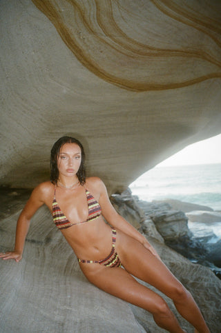 Brown, yellow and deep wine maroon red bikini. Stripe bikini. Sustainable, recycled bikini fabric