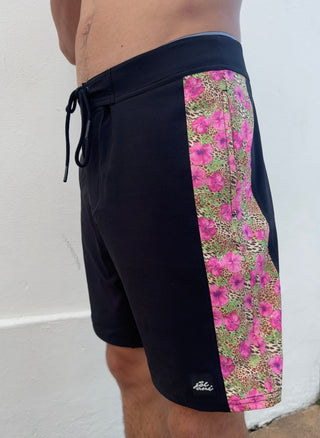 4-way stretch, quick dry black boardies/swimshorts. Fun pink hibiscus and leopard print pattern down the side panels, black boardies/trunks