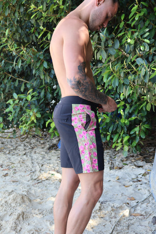 4-way stretch, quick dry black boardies/swimshorts. Fun pink hibiscus and leopard print pattern down the side panels, black boardies/trunks